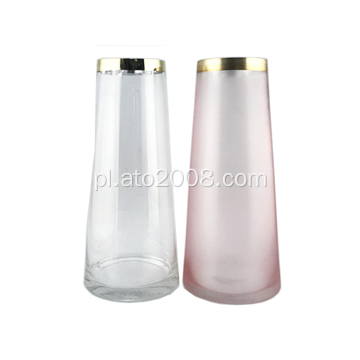 Przezroczysty i różowy szklany wazon ze złotą obręczą
